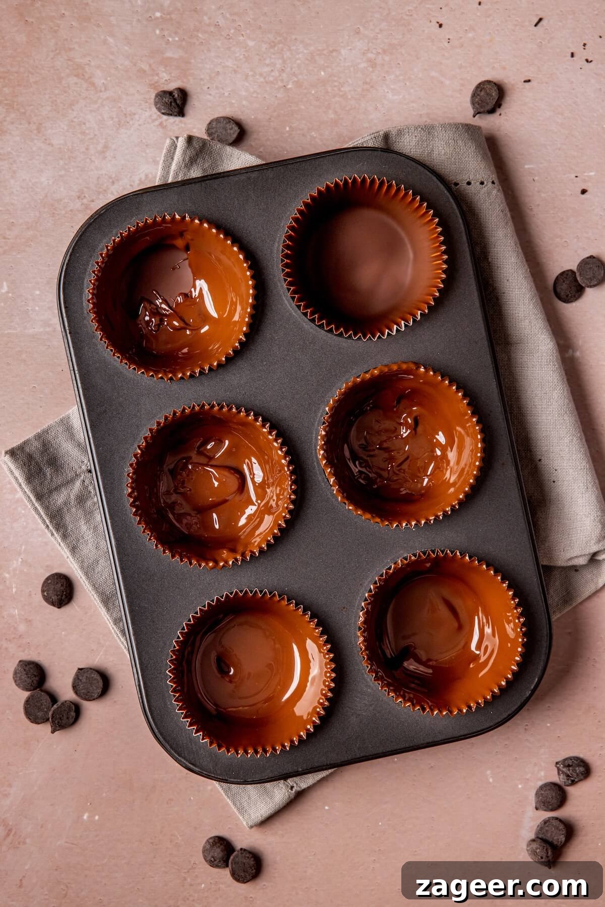 Step 6: Topping the yogurt filling with more melted chocolate