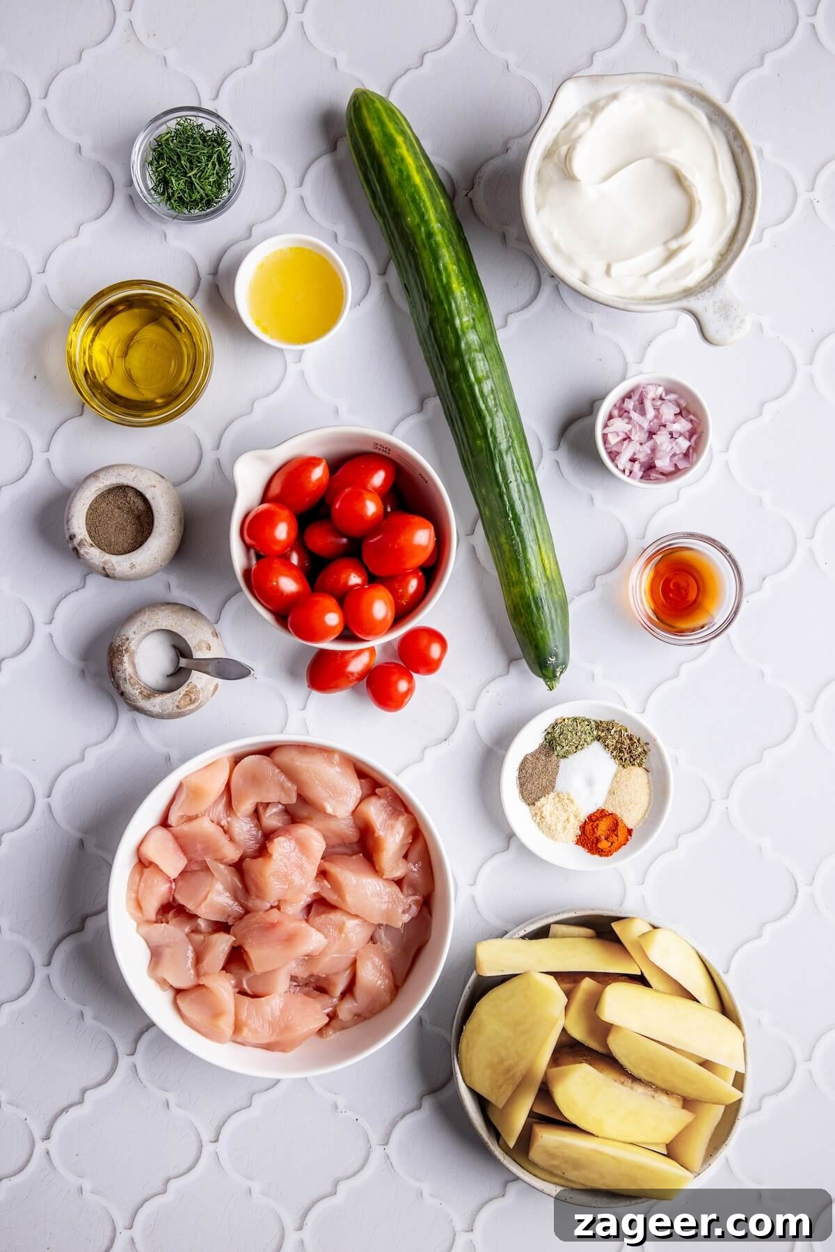 Ultimate Greek Chicken Bowl with Zesty Dairy-Free Tzatziki 6 A collection of ingredients laid out for Loaded Greek Chicken Bowl with Dairy-Free Tzatziki, ready for preparation.