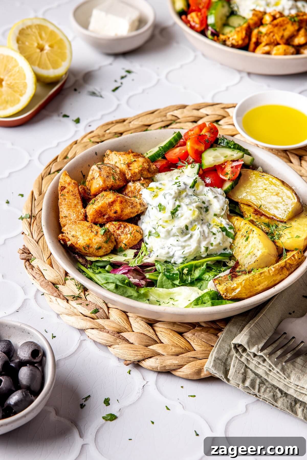 Ultimate Greek Chicken Bowl with Zesty Dairy-Free Tzatziki 7 Another appealing image of a completed Loaded Greek Chicken Bowl with Dairy-Free Tzatziki, highlighting its vibrant assembly.