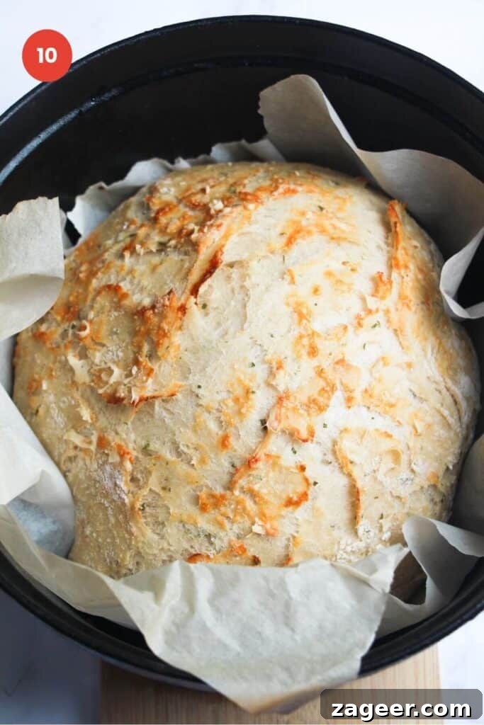 Artisan Style Rosemary Parmesan Bread Done Easy 13 Par baked rosemary parmesan bread in Dutch oven.