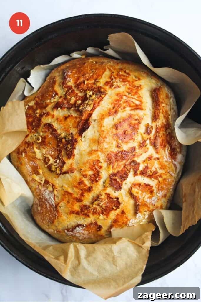 Artisan Style Rosemary Parmesan Bread Done Easy 14 Baked rosemary parmesan bread in Dutch oven.