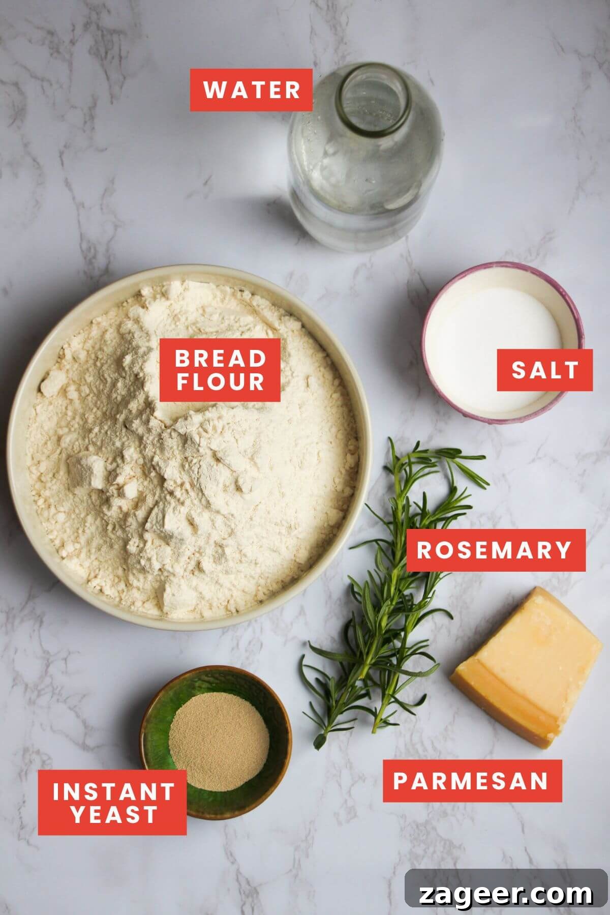 Artisan Style Rosemary Parmesan Bread Done Easy 3 Ingredients for rosemary parmesan bread laid out on a white marble background and clearly labelled.