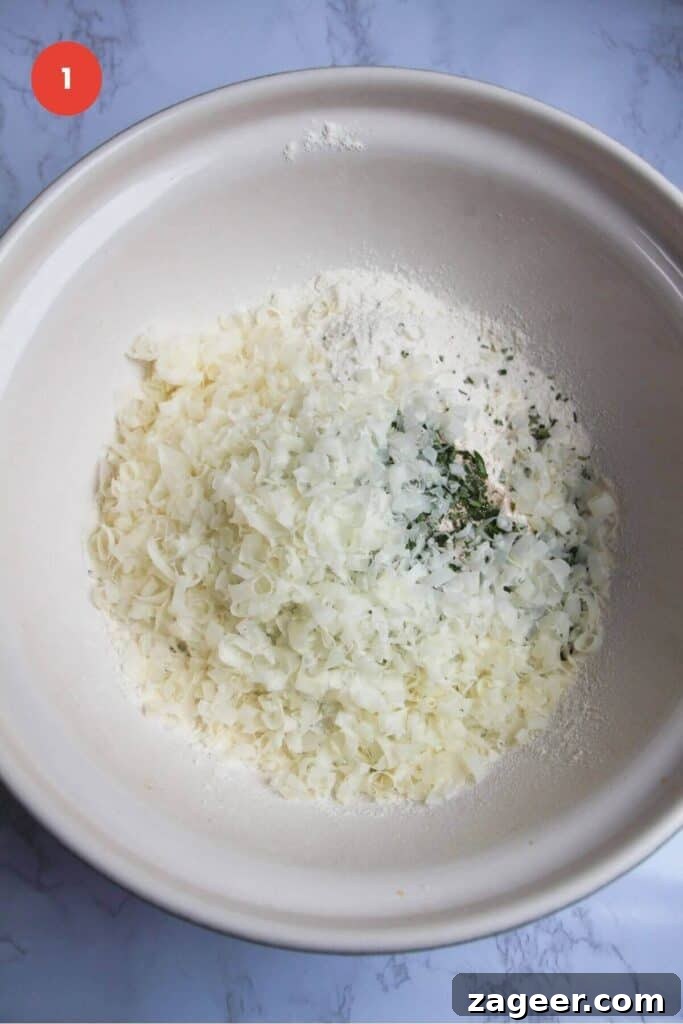 Artisan Style Rosemary Parmesan Bread Done Easy 4 Ingredients for rosemary parmesan bread in mixing bowl.