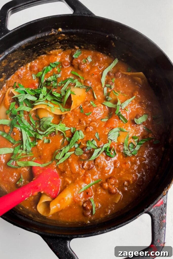 Stealthy Veggie One Pot Lasagna Soup 10 Sliced basil leaves added to soup in a large pot, for fresh aroma and flavor.