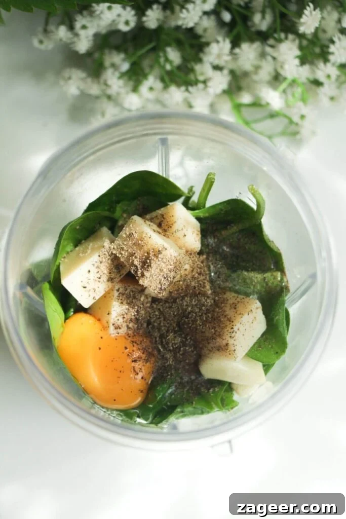 Silky Pancetta, Pea, and Spinach Pasta 4 Fresh eggs, grated parmesan cheese, vibrant spinach, and aromatic basil placed inside a blender, ready to be blitzed into a creamy sauce.