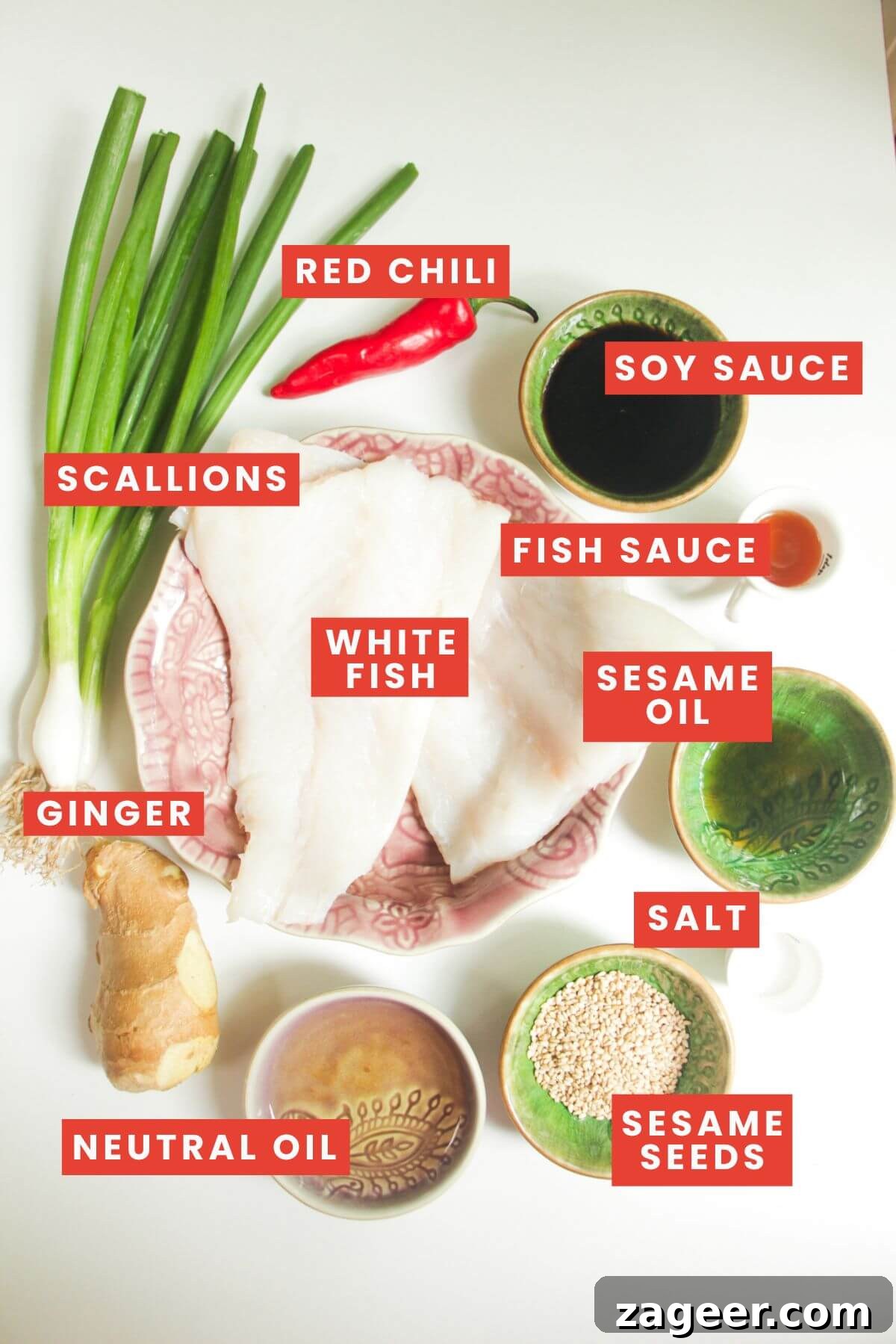 Aromatic Hot Oil Steamed Fish 3 All the necessary ingredients for sizzling oil steamed fish, neatly laid out and clearly labelled on a kitchen counter.