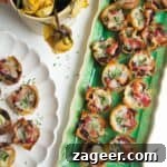 Caramelized onion filo bites on a green plate.