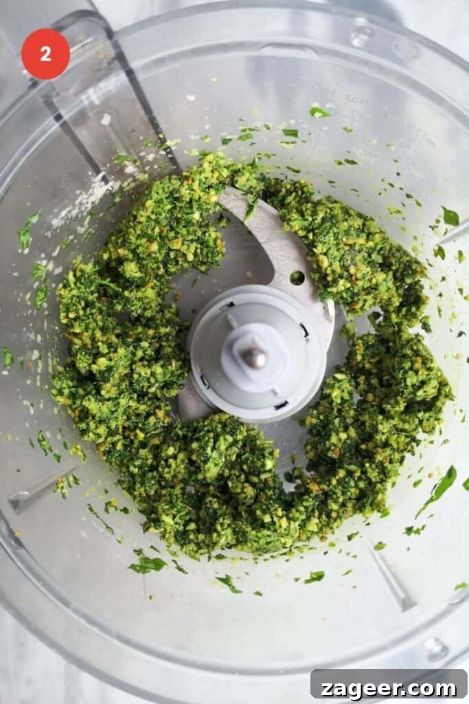 Homemade Basil Pesto So Good So Fast 5 Basil pesto ingredients blended to a paste.