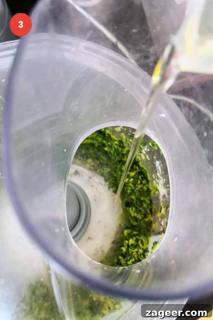 Homemade Basil Pesto So Good So Fast 6 Olive oil poured into food processor.