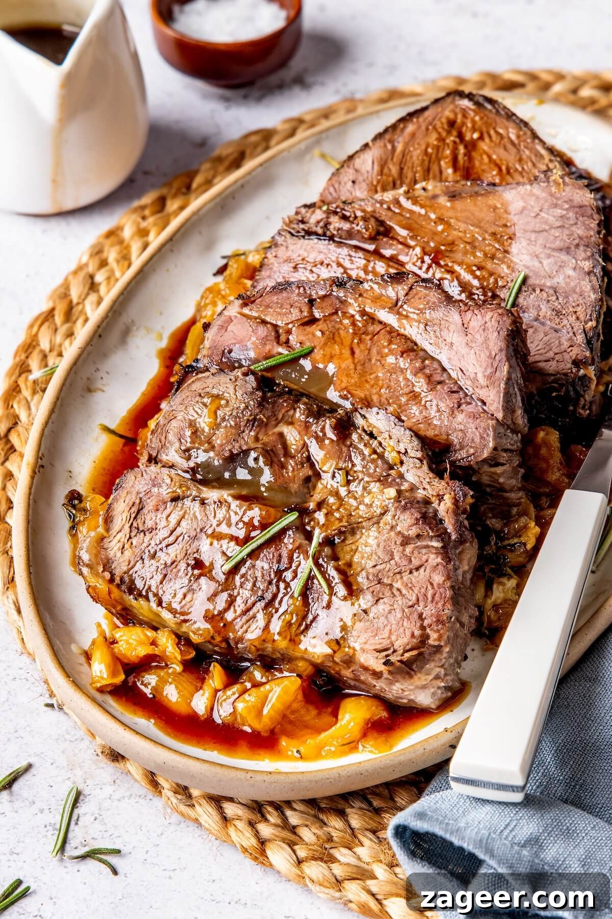 Tender Chuck Roast with Savory Au Jus 4 Perfectly Roasted Pot Roast Ready for Serving