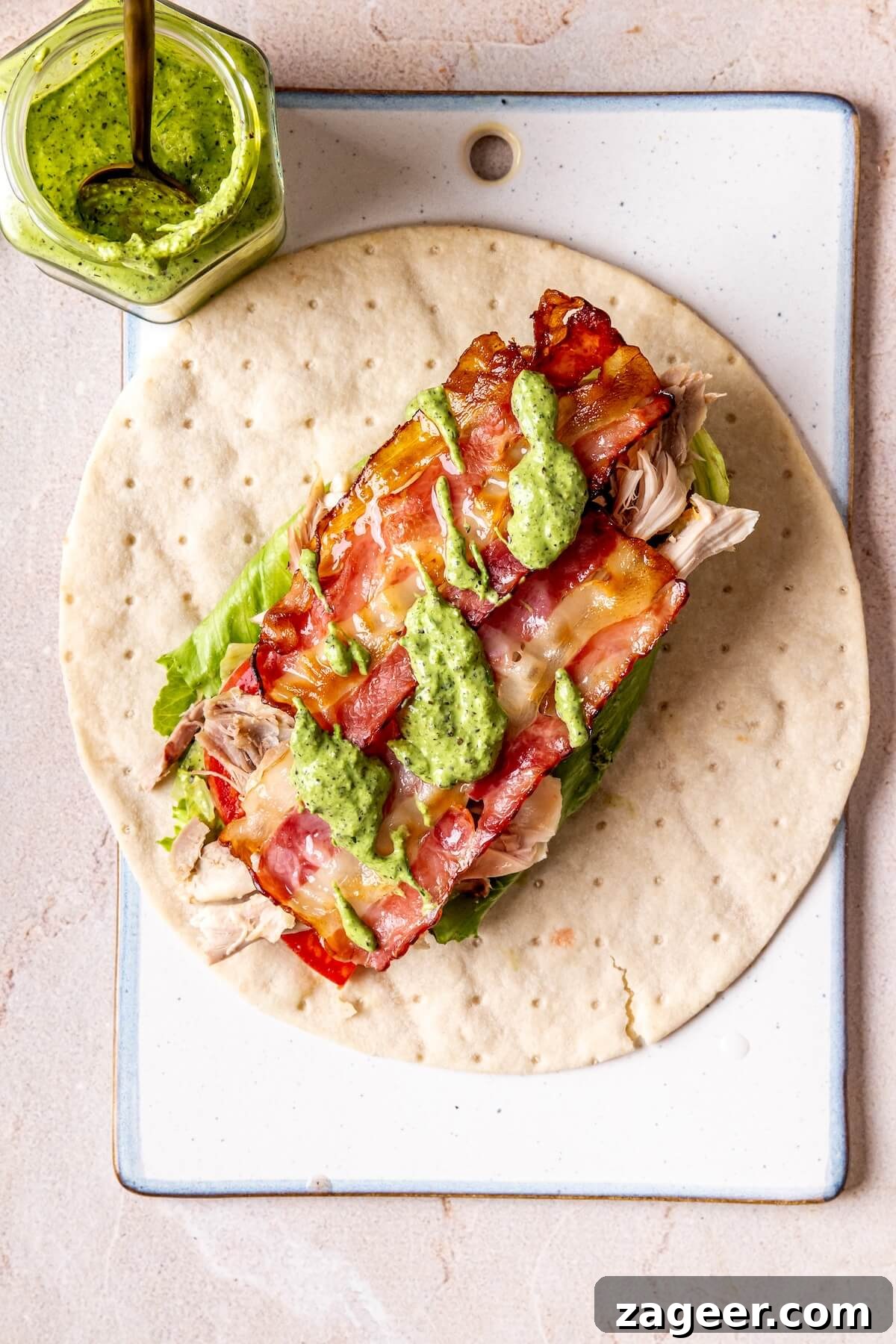 Loaded Green Goddess Chicken Bacon Ranch Wraps 11 Step 5: Finished Chicken Bacon Green Goddess Ranch Wraps, cut in half