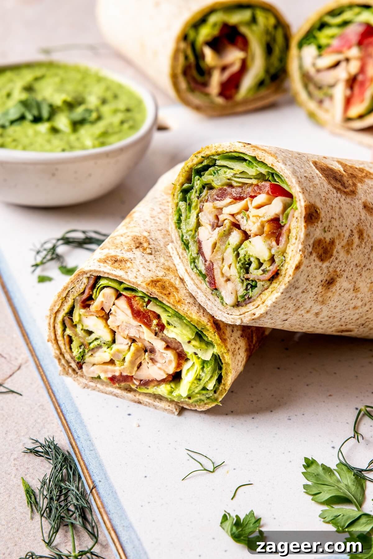 Loaded Green Goddess Chicken Bacon Ranch Wraps 3 Two Chicken Bacon Green Goddess Ranch Wraps with fresh ingredients
