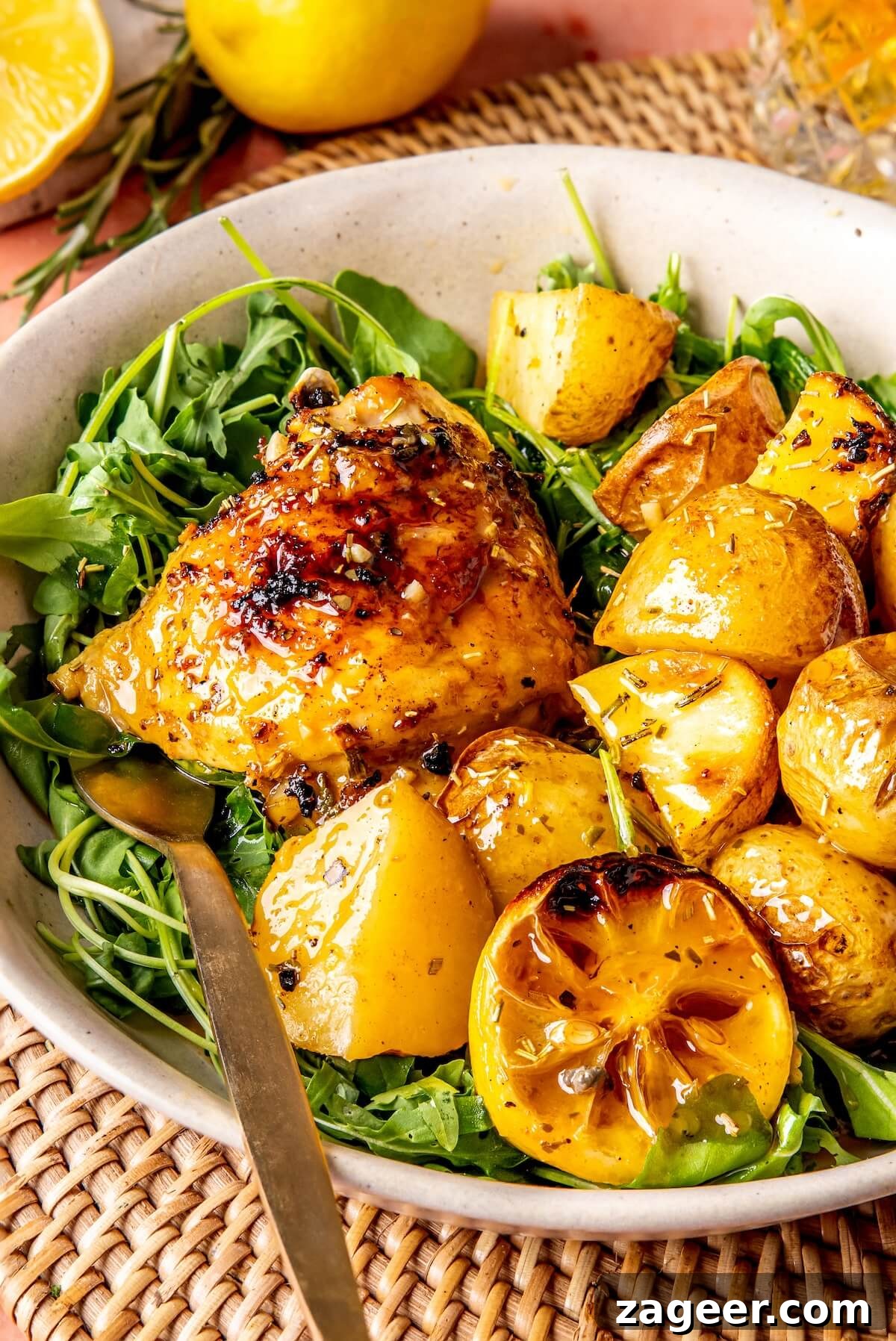 Sheet Pan Lemon Herb Roasted Chicken and Potatoes 4 Serving roasted lemon chicken and potatoes with fresh arugula