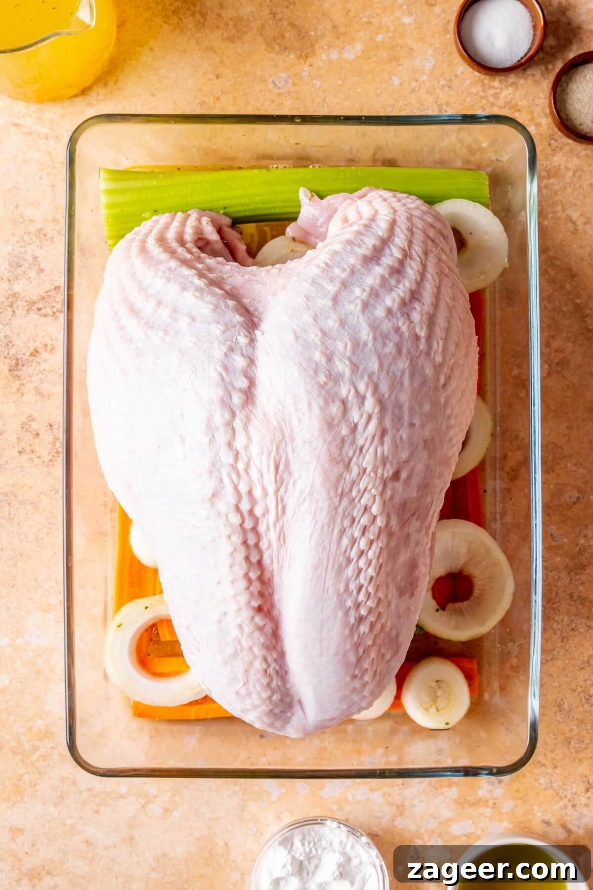 Effortless Oven-Roasted Turkey Breast with Rich Gravy 6 Step 2: Placing turkey breast on vegetables and adding stock