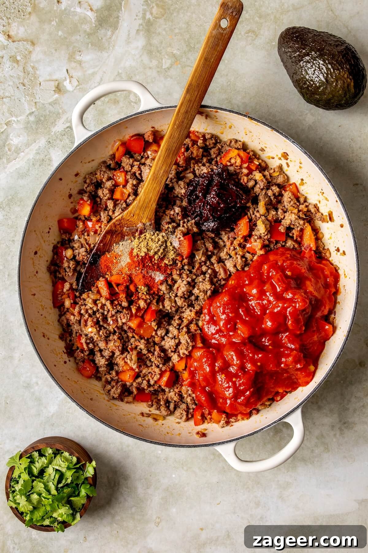 Loaded Chipotle Chorizo Sweet Potatoes 11 Step 4: The aromatic mixture of meat, vegetables, and spices simmering together.