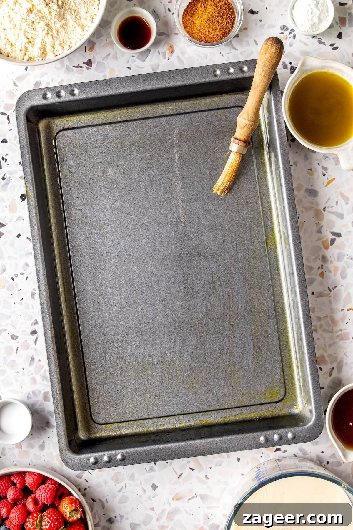Gluten Free Sheet Pan Pancake Bake 7 Mixing wet ingredients for sheet pan pancakes in a bowl.