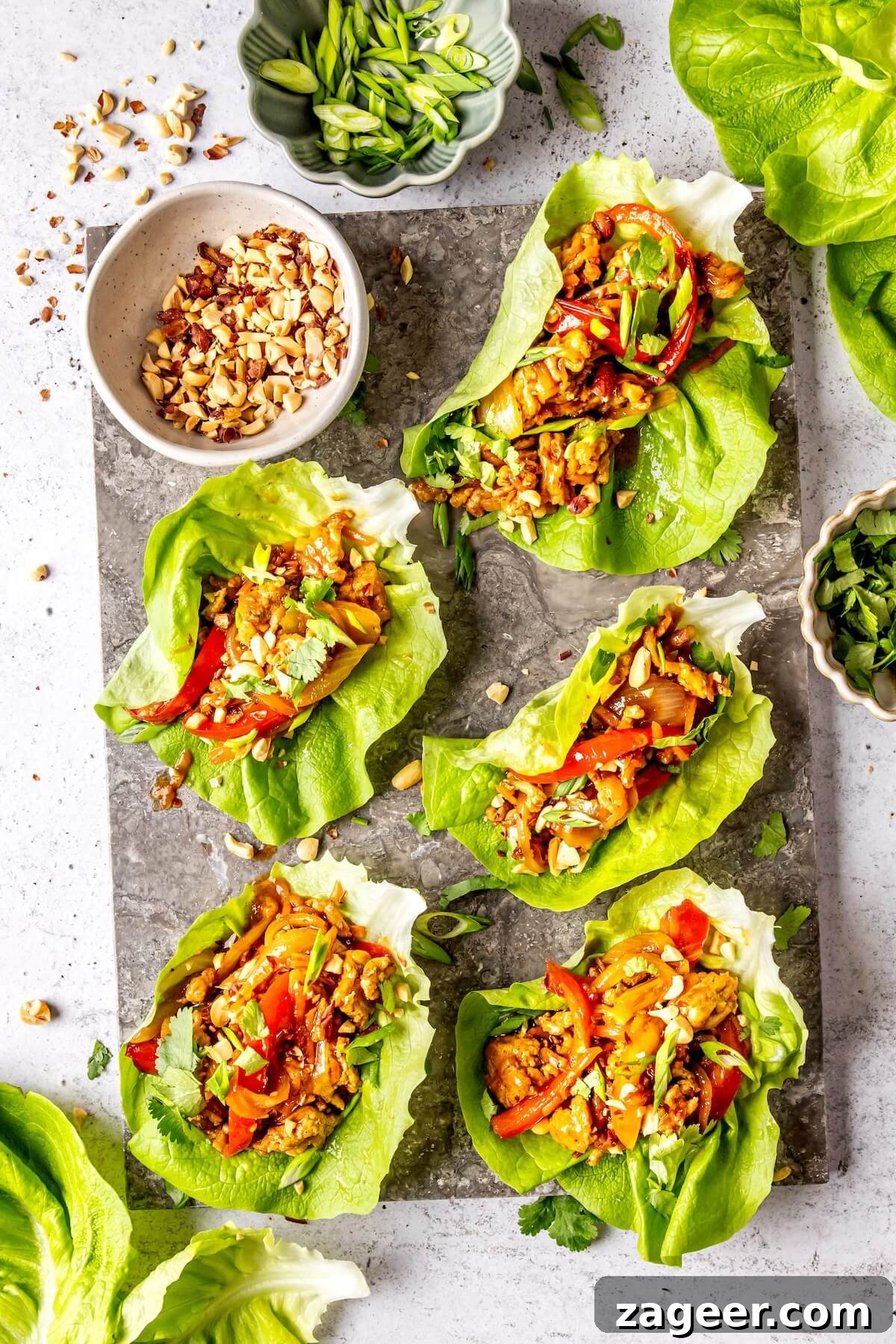 Glazed Sticky Pork Lettuce Wraps 3 Freshly prepared Sticky Saucy Pork Lettuce Cups with garnishes