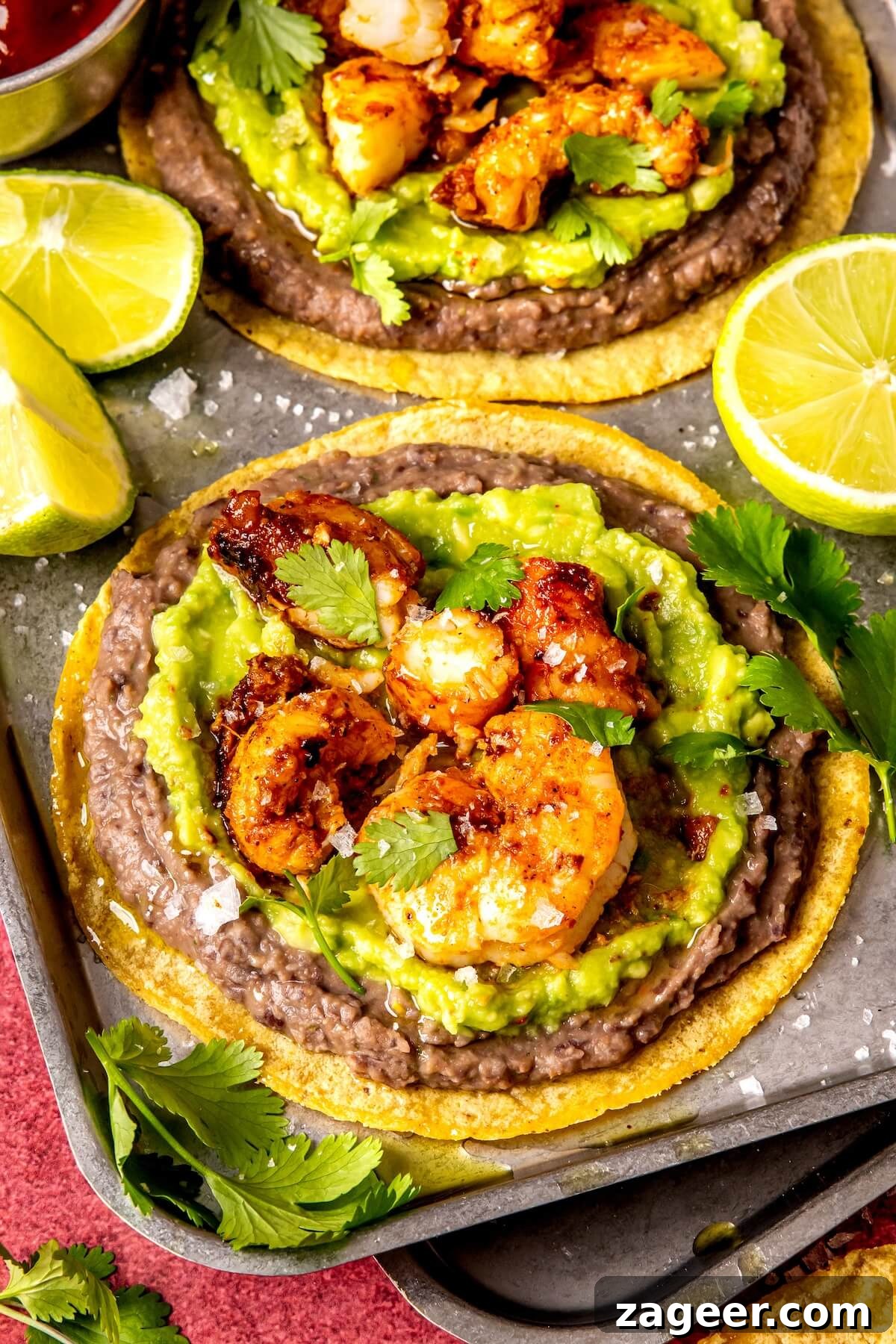 Effortless Shrimp Tostadas 4 Close-up of a perfectly assembled Super Simple Shrimp Tostada with layered ingredients