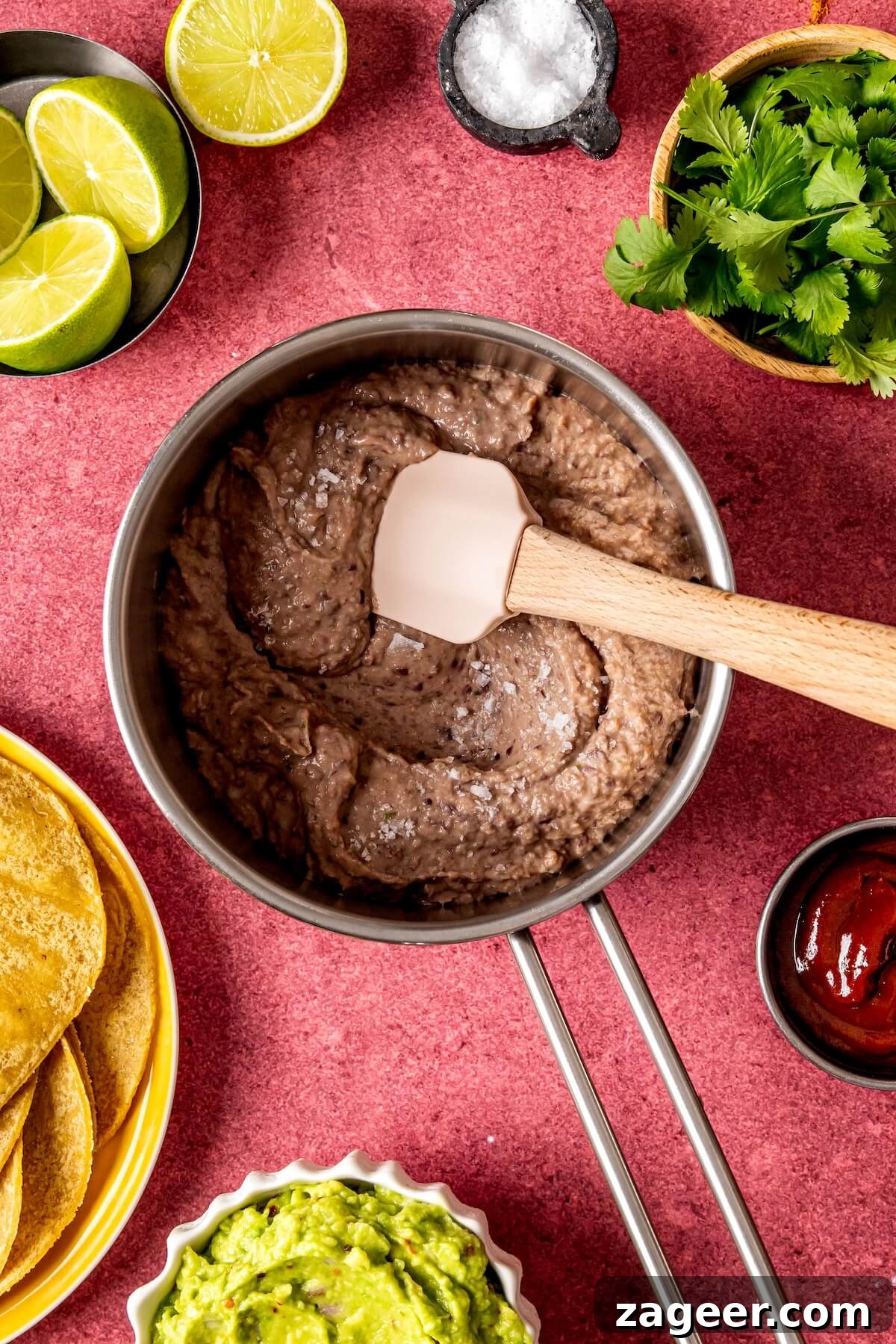 Effortless Shrimp Tostadas 9 Corn tortillas being brushed with avocado oil before baking into tostada shells