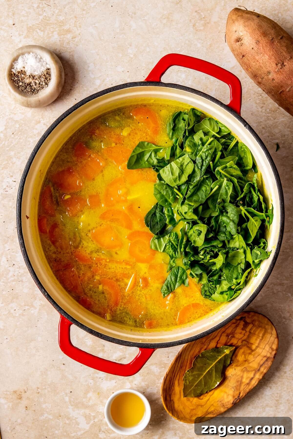 Golden Turmeric Healing Chicken Stew 12 Step 6: Cooked Turmeric Chicken Stew in a pot, ready to serve