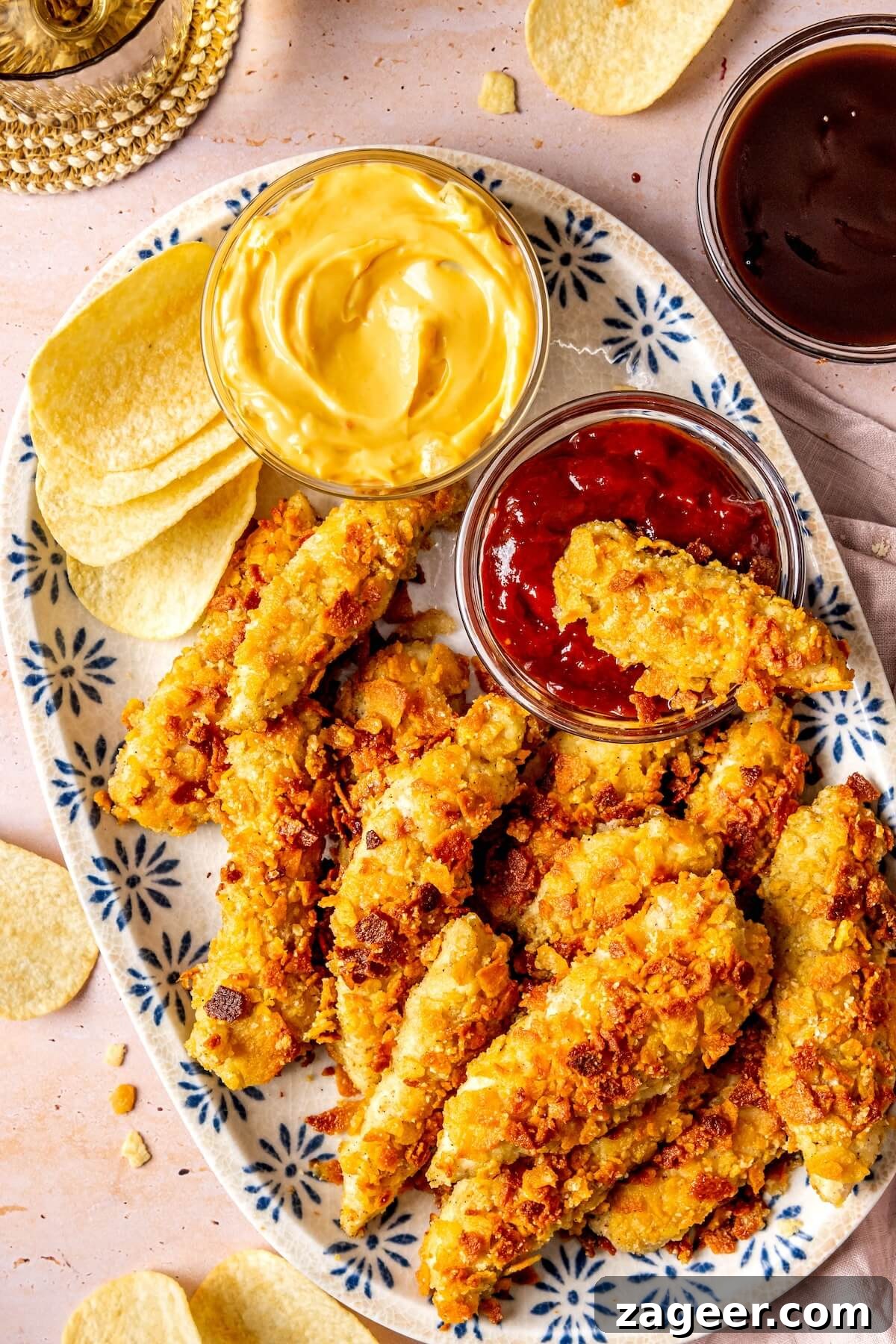 Preparing the breading station for potato chip crusted chicken tenders