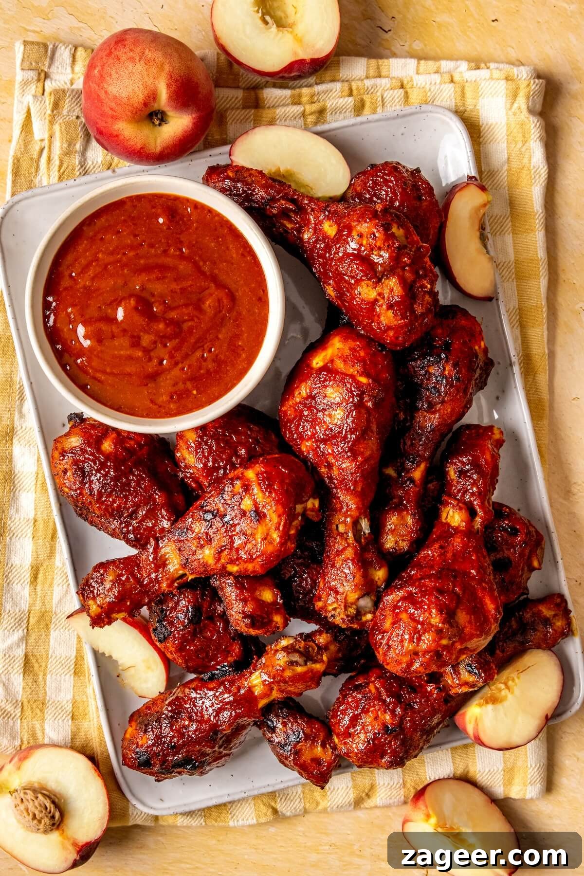 Sweet Peach Glazed Chicken Drumsticks 3 Close-up of baked Peach BBQ Sauce Chicken Drumsticks, ready to serve - Olivia Adriance