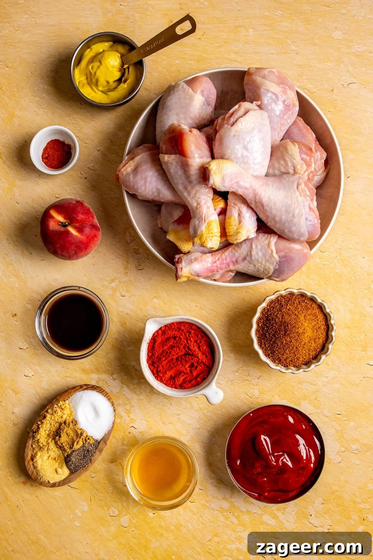 Sweet Peach Glazed Chicken Drumsticks 6 Ingredients for Peach BBQ Sauce Chicken Drumsticks laid out on a table - Olivia Adriance
