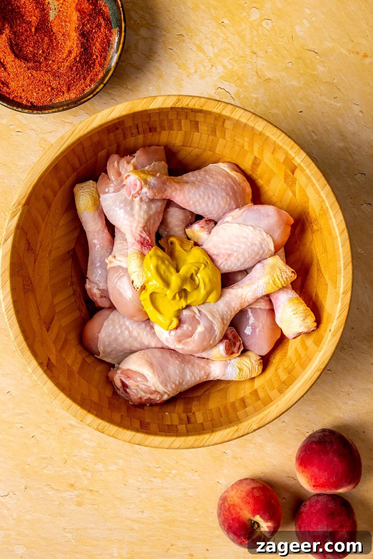 Sweet Peach Glazed Chicken Drumsticks 10 Step 3: Preparing the baking sheet with parchment paper and a wire rack - Olivia Adriance