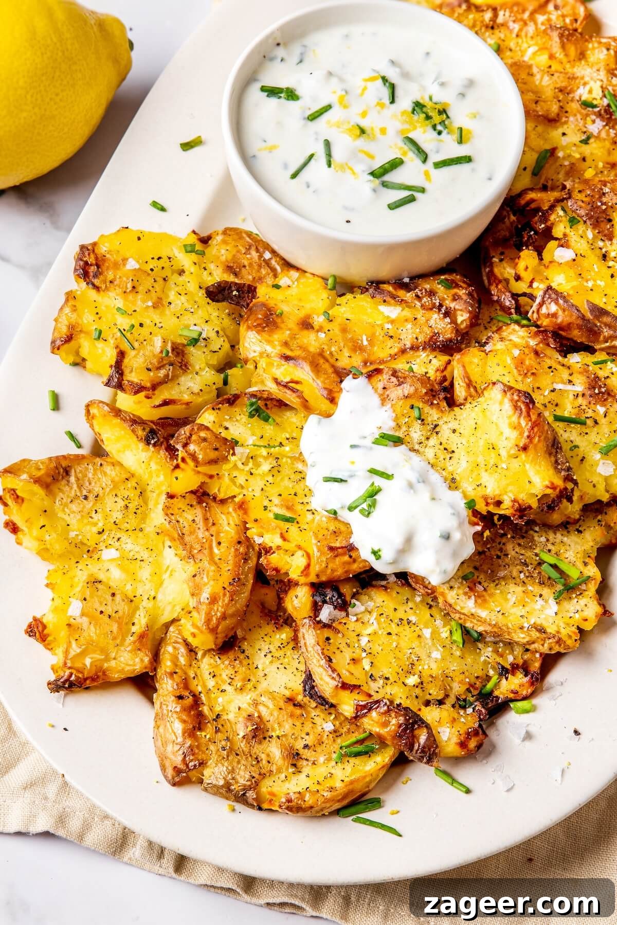 22 Crowd-Pleasing Gluten-Free Side Dishes 6 Crispy Smashed Potatoes with Lemony Chive Sauce - Olivia Adriance