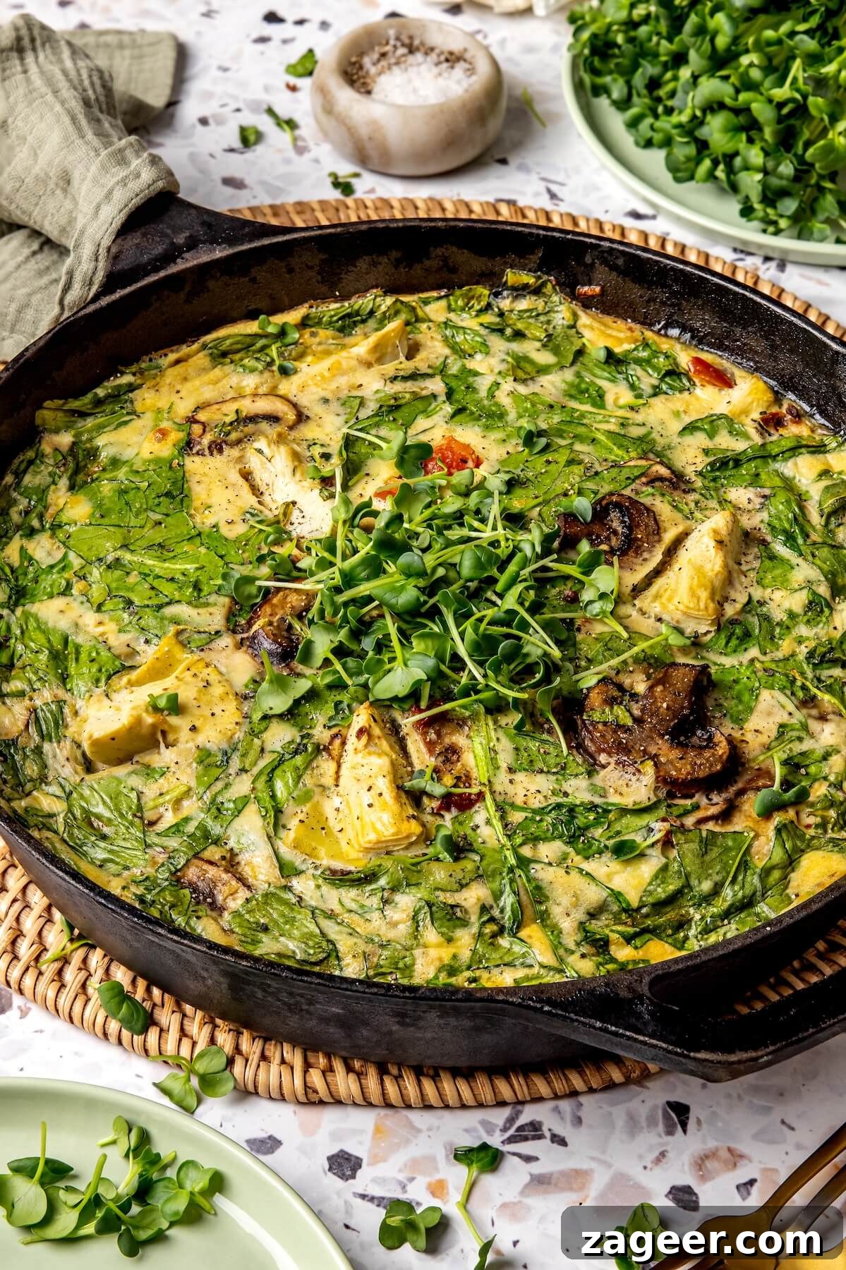 Wholesome Spinach, Mushroom, and Artichoke Frittata 3 Close-up of freshly baked Spinach Mushroom and Artichoke Frittata slices