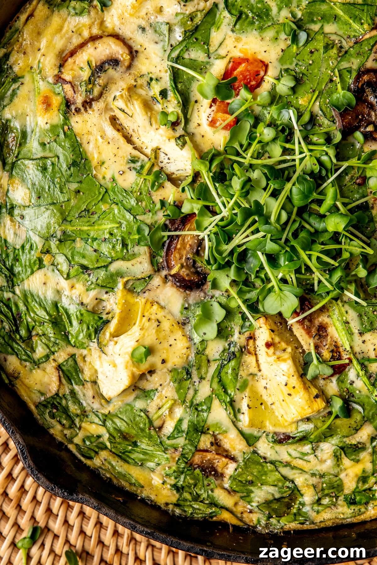Wholesome Spinach, Mushroom, and Artichoke Frittata 7 Close-up of a slice of the baked frittata showcasing its texture