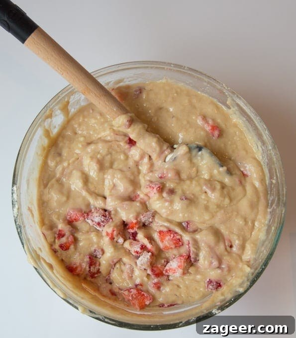 Irresistible Strawberry Crumble Cupcakes 3 Strawberry Streusel cupcakes - Light, fluffy sponge with chunks of juicy strawberry, topped with crunchy streusel and a sweet strawberry drizzle