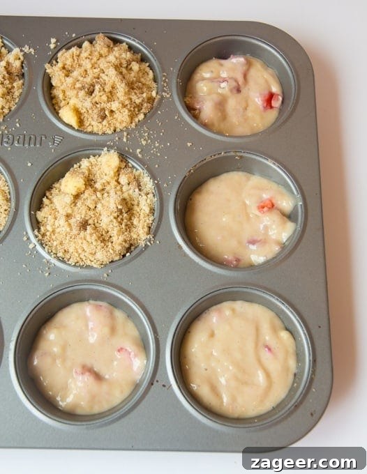 Irresistible Strawberry Crumble Cupcakes 4 Strawberry Streusel cupcakes - Light, fluffy sponge with chunks of juicy strawberry, topped with crunchy streusel and a sweet strawberry drizzle