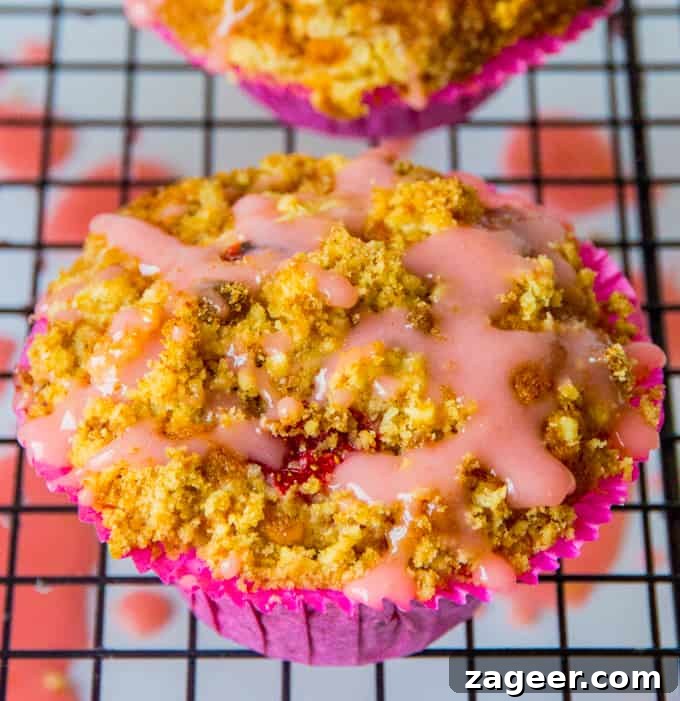 Irresistible Strawberry Crumble Cupcakes 7 Strawberry Streusel cupcakes - Light, fluffy sponge with chunks of juicy strawberry, topped with crunchy streusel and a sweet strawberry drizzle