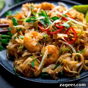 Prawn Pad Thai on a dark plate