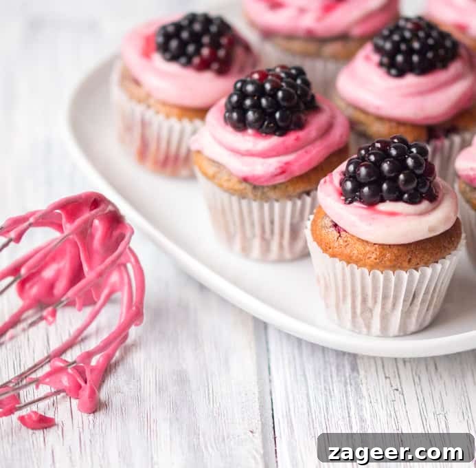 Autumn Spiced Blackberry Poppers 2 Blackberry Spice Muffin Bites - Sweet little muffin bites made with mixed spices and topped with a ginger and blackberry frosting, perfect for any occasion.