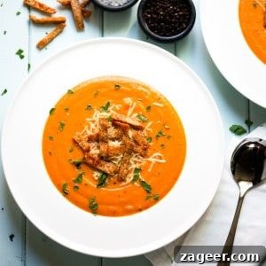 Wholesome Red Pepper Lentil Soup with Crunchy Wholemeal Pita 4 Lentil and Red Pepper Soup with Wholemeal Pita Crisps in a bowl