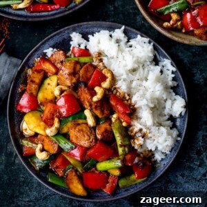 Szechuan Chili Peanut Chicken 10 Square image of homemade Kung Pao Chicken served with rice, highlighting the rich sauce and fresh ingredients.