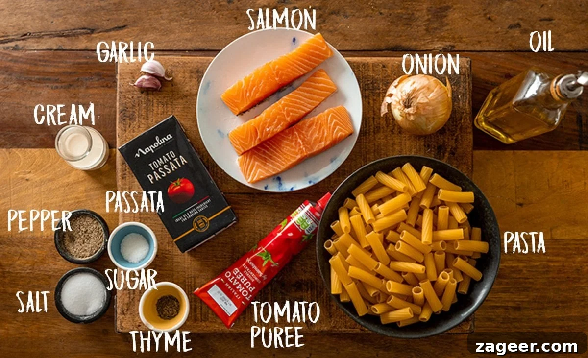 Blush Salmon Rigatoni 3 Ingredients for creamy tomato salmon rigatoni on a wooden table