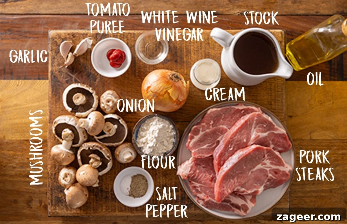 Fall-Apart Slow Cooker Smothered Pork Chops 3 Ingredients for slow cooker smothered pork chops on a wooden board.
