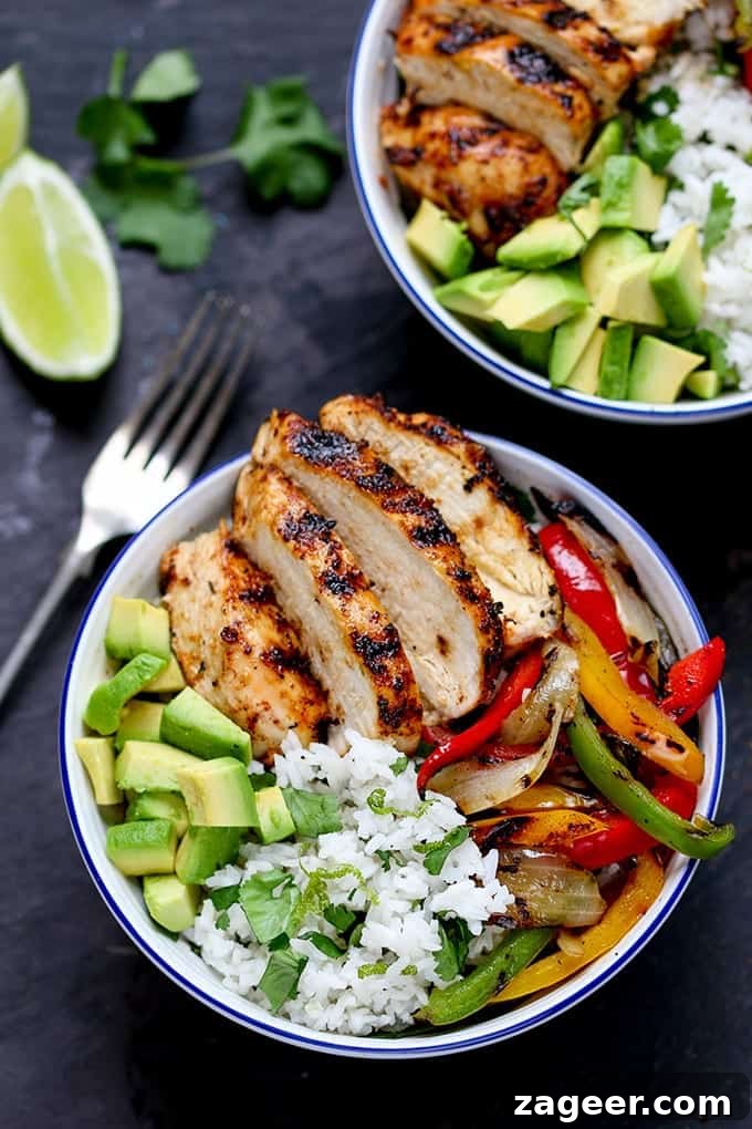 Bright Cilantro Lime Rice with Fiery Cajun Chicken 2 A bowl full of griddled Cajun chicken with charred veggies and coriander-lime rice, showcasing a perfectly balanced and quick meal.