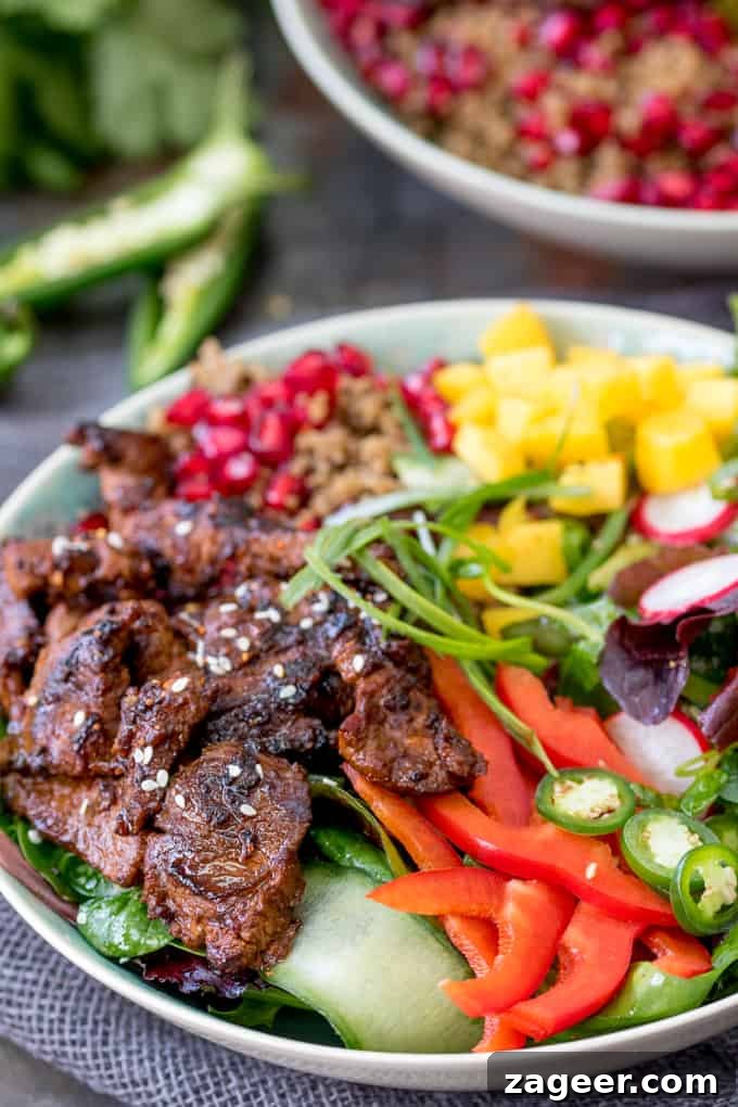Delicious Korean Beef Bulgogi Bowl with fresh colorful veggies in a bowl, ready to be served.