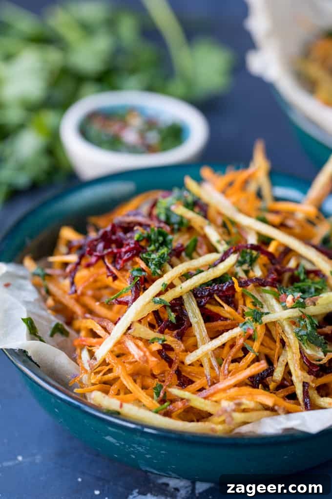 Crispy Veggie Sticks with Artisan Herb Salt 4 A bowl of freshly made Vegetable Matchstick Fries with a side of homemade herb salt, ready for serving.