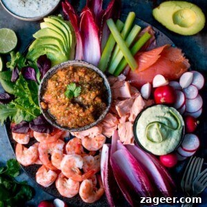 Seafood Extravaganza with a Trio of Dips 4 A vibrant, artfully arranged Seafood Party Platter, complete with three distinct dips, promising a delightful culinary experience for any festive occasion.