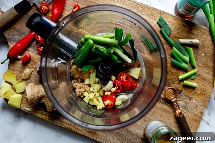 Golden Thai Fish Fritters and Vibrant Vegetable Ribbons 2 fresh ginger, spring onions, chillies ans spices ina food processor