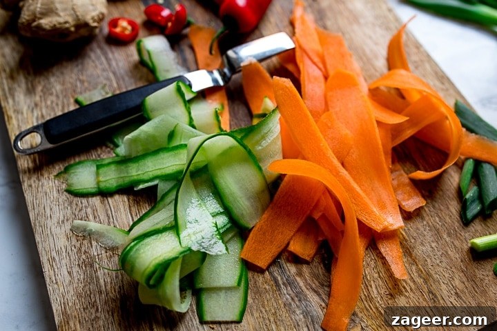 Golden Thai Fish Fritters and Vibrant Vegetable Ribbons 9 vegetable ribbons on a chopping board