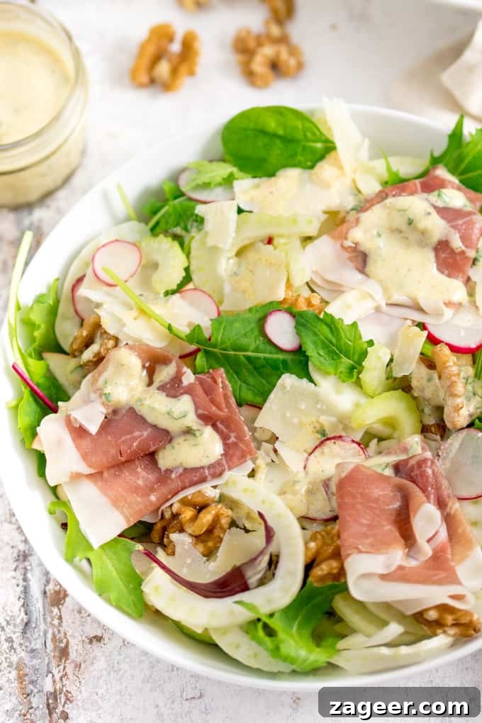Crisp Winter Delight: Apple Fennel Salad with Prosciutto and Grana 3 Overhead Photo of Fennel and Apple Winter Salad in a bowl ready to be served