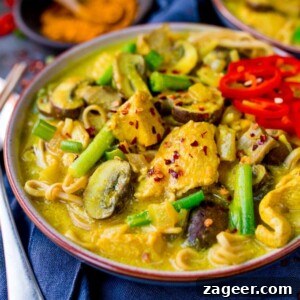 Golden Turmeric Chicken Noodle Soup 2 This Chicken Noodle Soup with Turmeric is satisfying comfort food - filling enough for dinner!