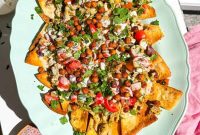 Greek Chicken Nachos with Crispy Pita Chips and Tzatziki Crunch