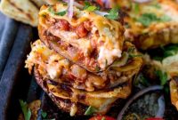 Lasagna-Stuffed Potato Skins with Melty Cheese and Meat